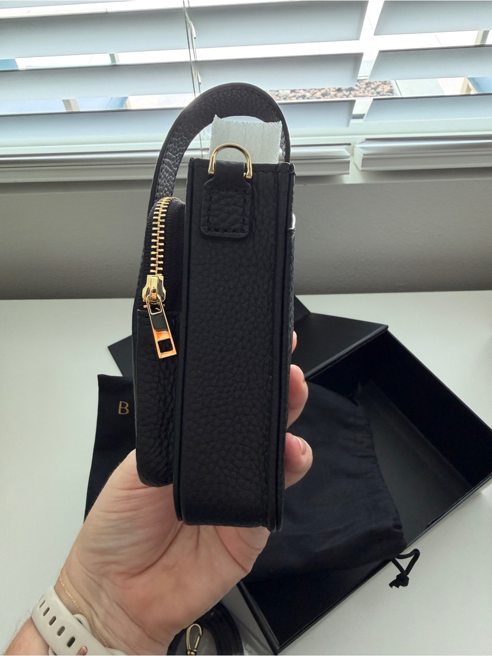 Bandolier Black Pebbled Leather Crossbody Phone Pouch with Gold Accents - Picture 5 of 9